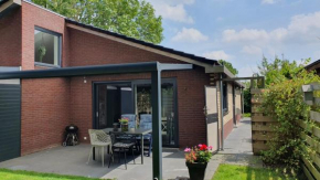 Luxe zomerwoning met omheinde tuin voor hond en kinderen